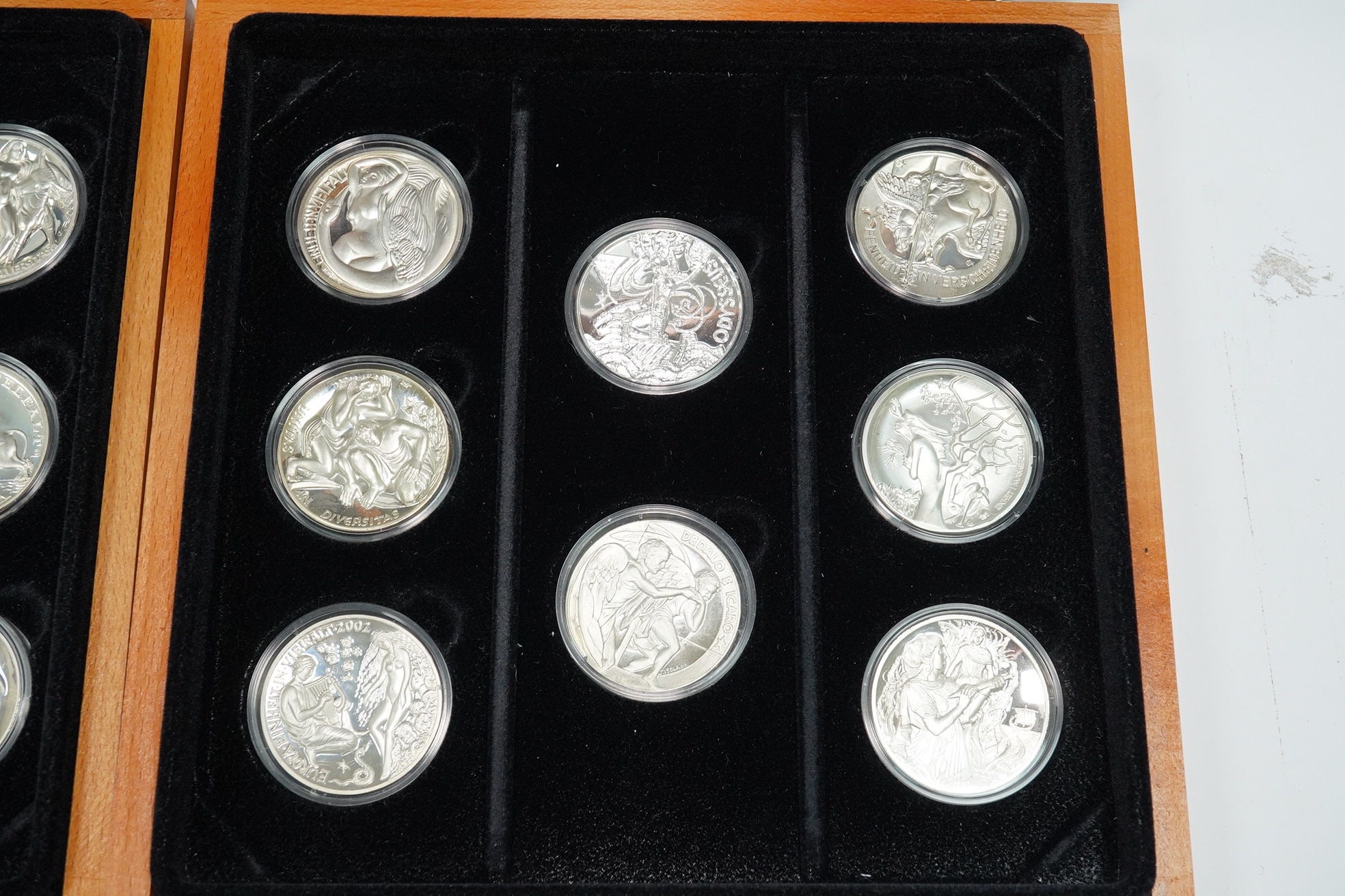 European Medal Club (EMC), two cased sets of sterling silver medals, the first set of six medals relating to Europa and the Bull, the second set of eight medals to mythological couples (14)